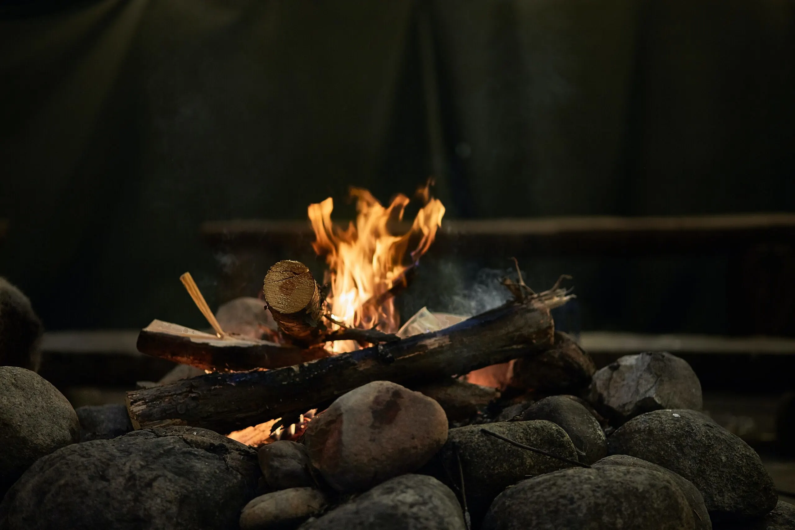 campfire burning on stones