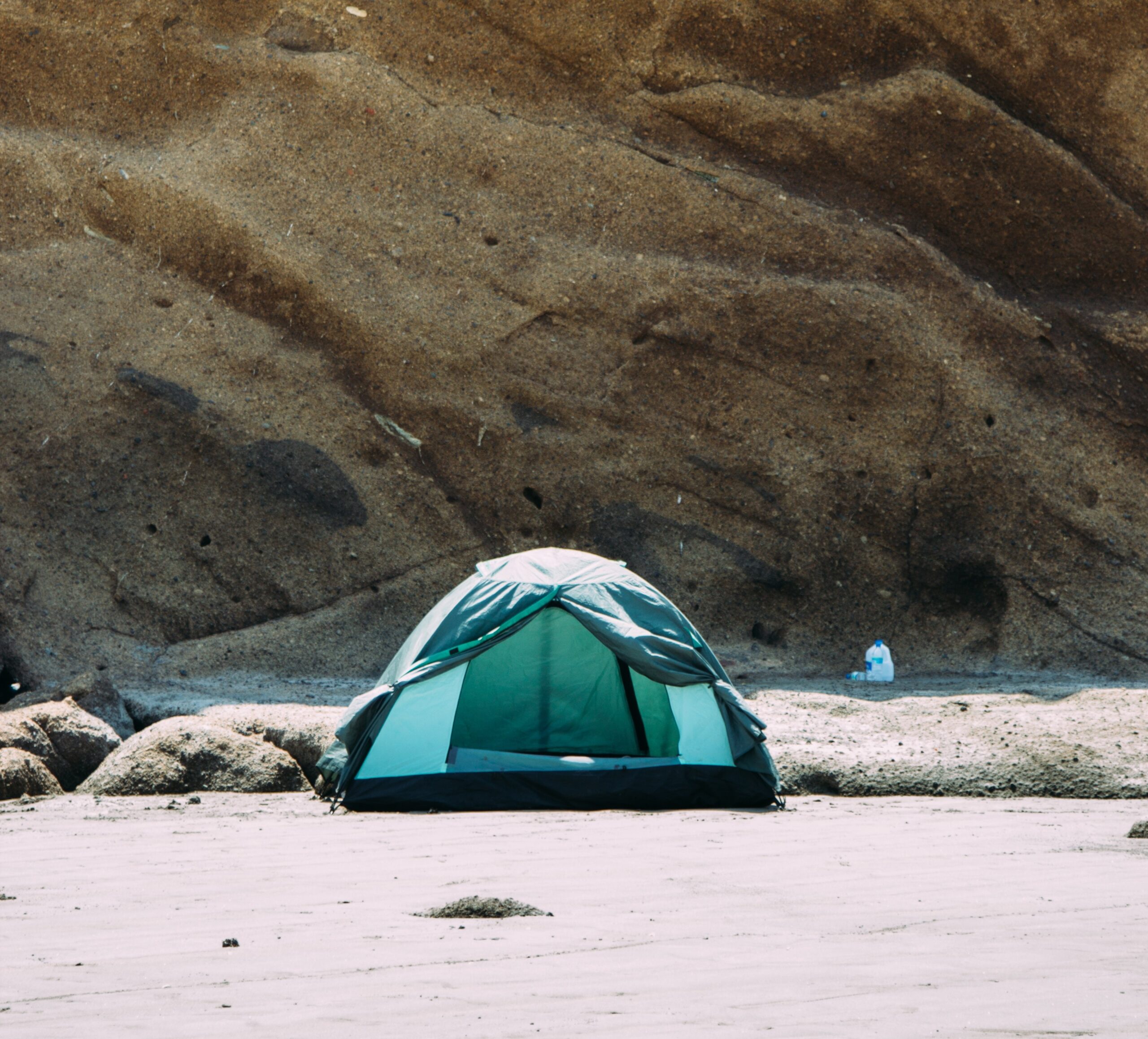 Black and Green Camping Dome Tent On Beach
