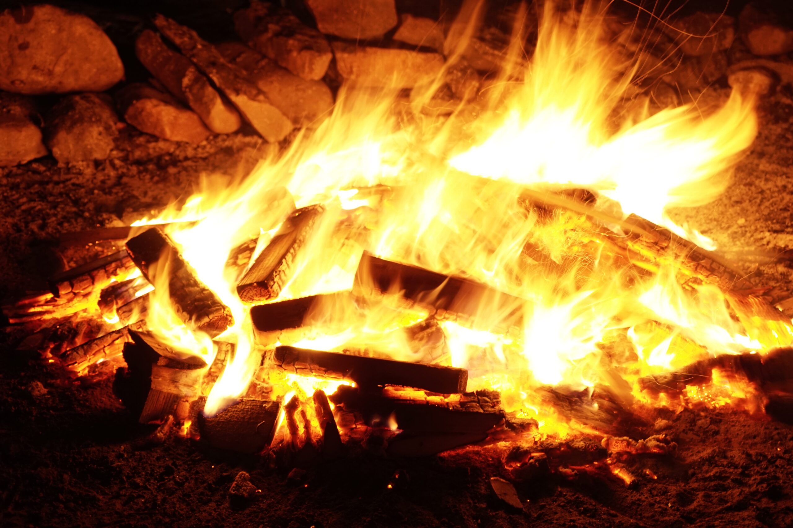 campfire burning at night