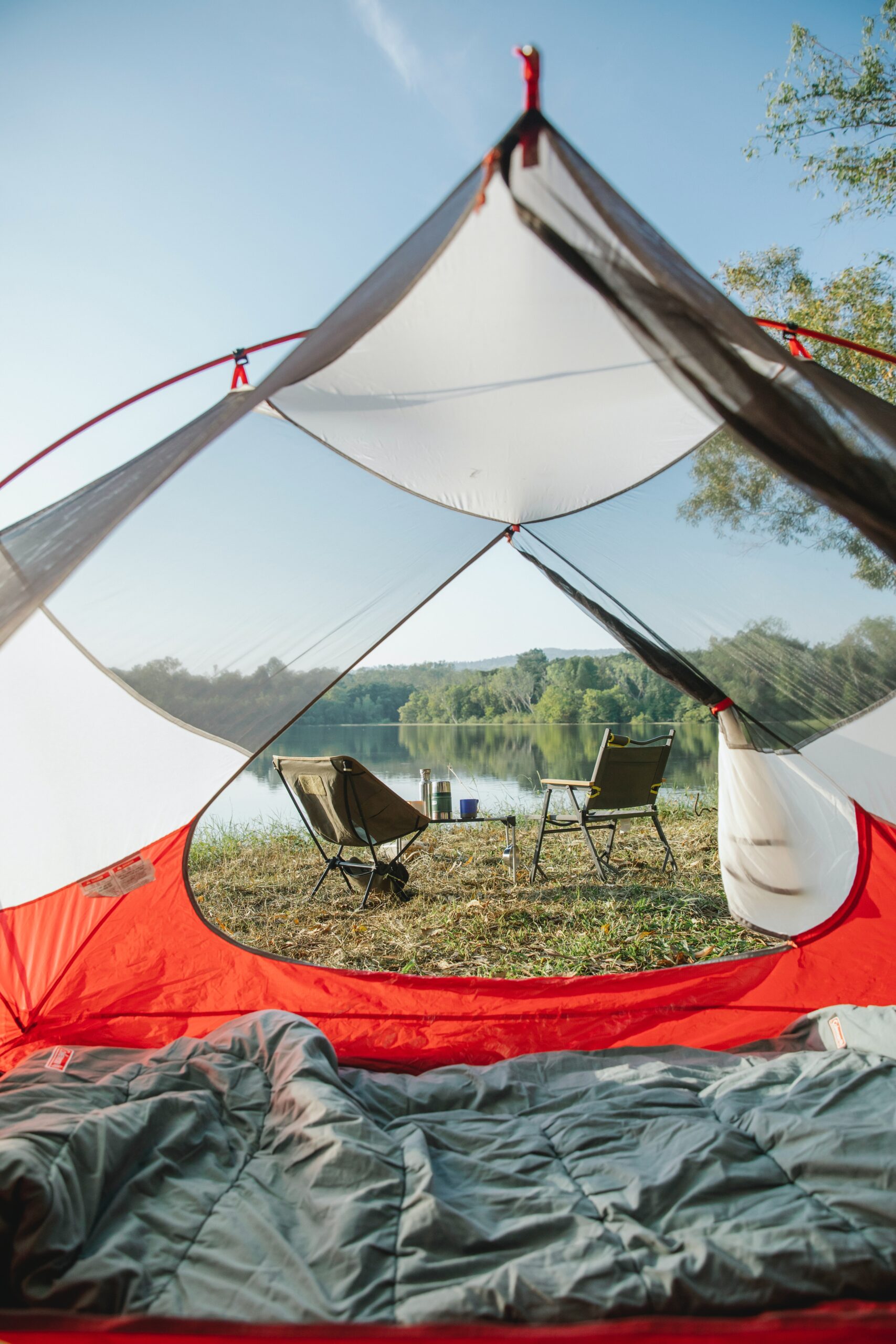 sleeping bag in tent in field